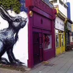 ROA rabbit mural on a Hackney street corner